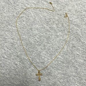 Gold necklace with pendent included. Pendent is gold and silver